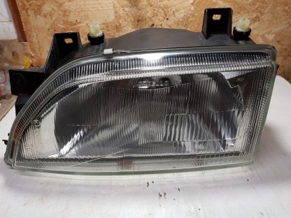 Ford Escort mk5 LH headlamp Carello